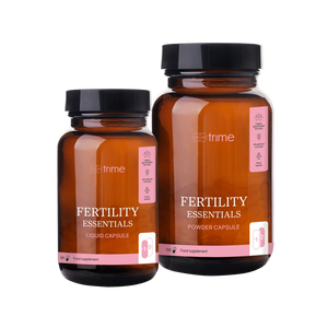 Two bottles of 'Fertility Essentials' supplements by Strime on a transparent background